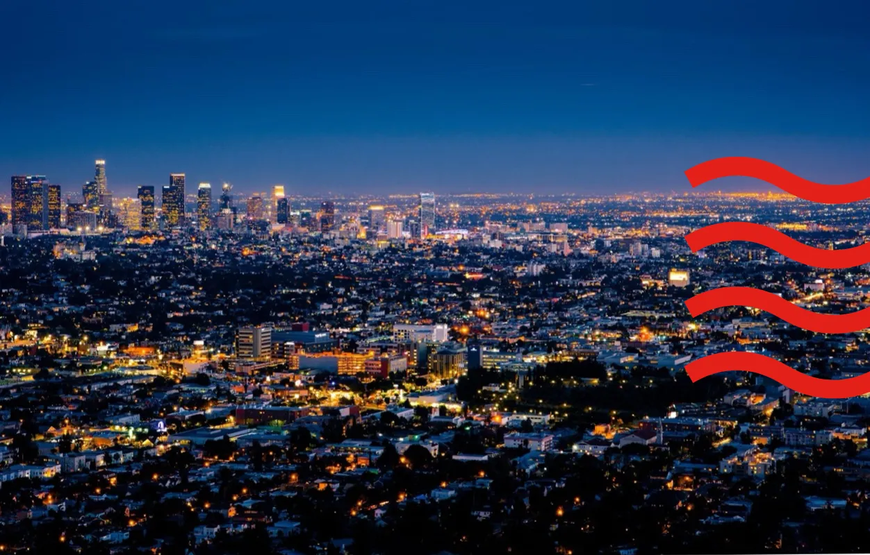 Night-time city skyline with glowing lights