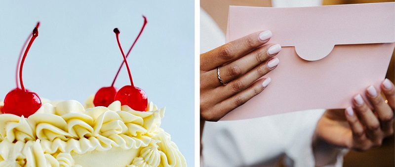 cake with cherries next to hands holding pink envelope
