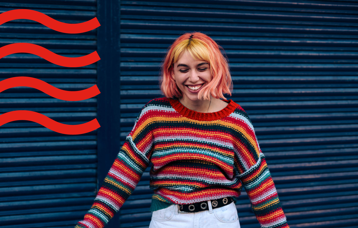 A girl with a colorful jumper