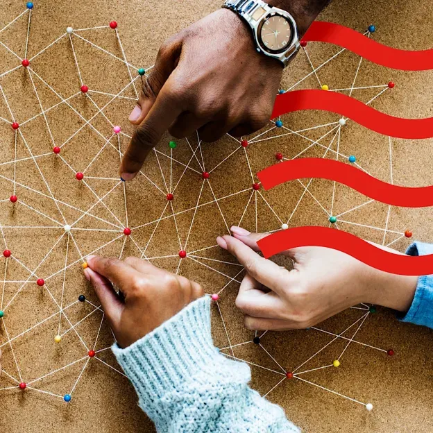 People adding pins to a board