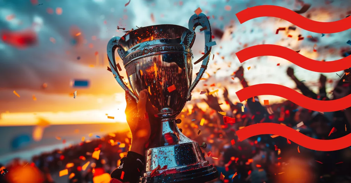 Person holding a trophy with confetti in the air.