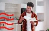 A man reading a letter