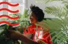 A woman watering her plants