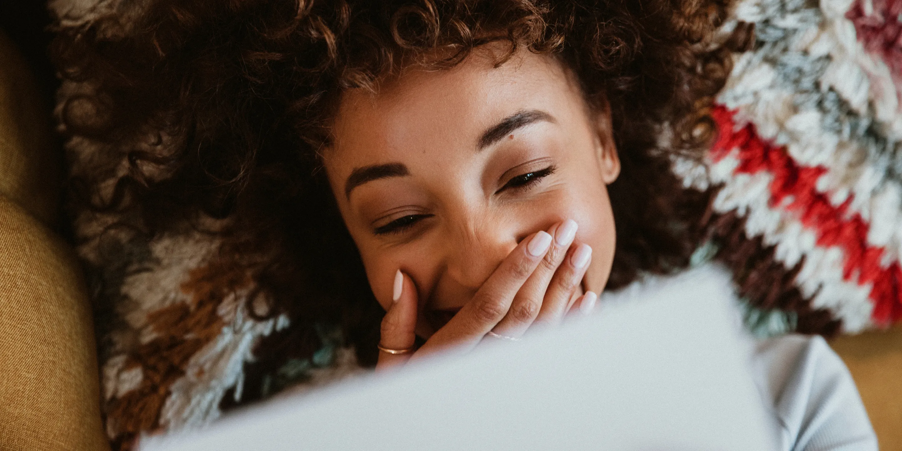 A woman reading a letter
