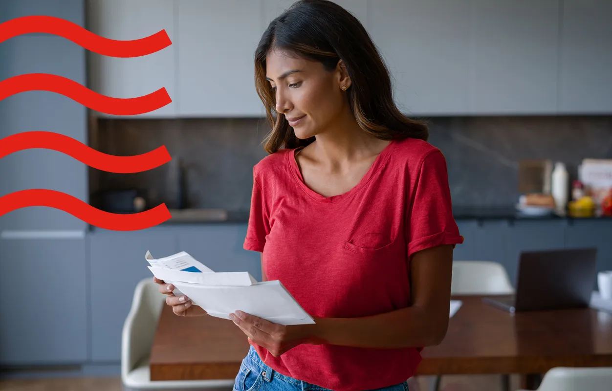 A woman reading a letter
