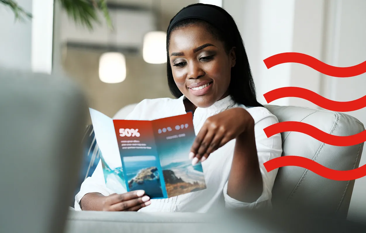 A woman reading a brochure