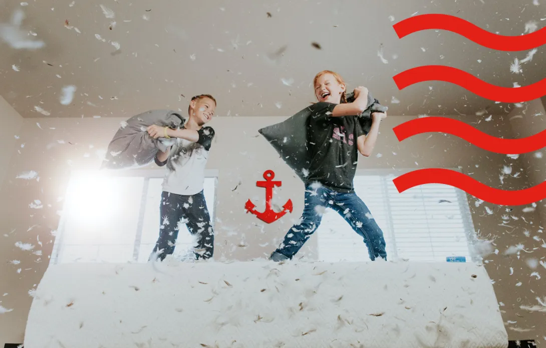 Kids playing pillow fight
