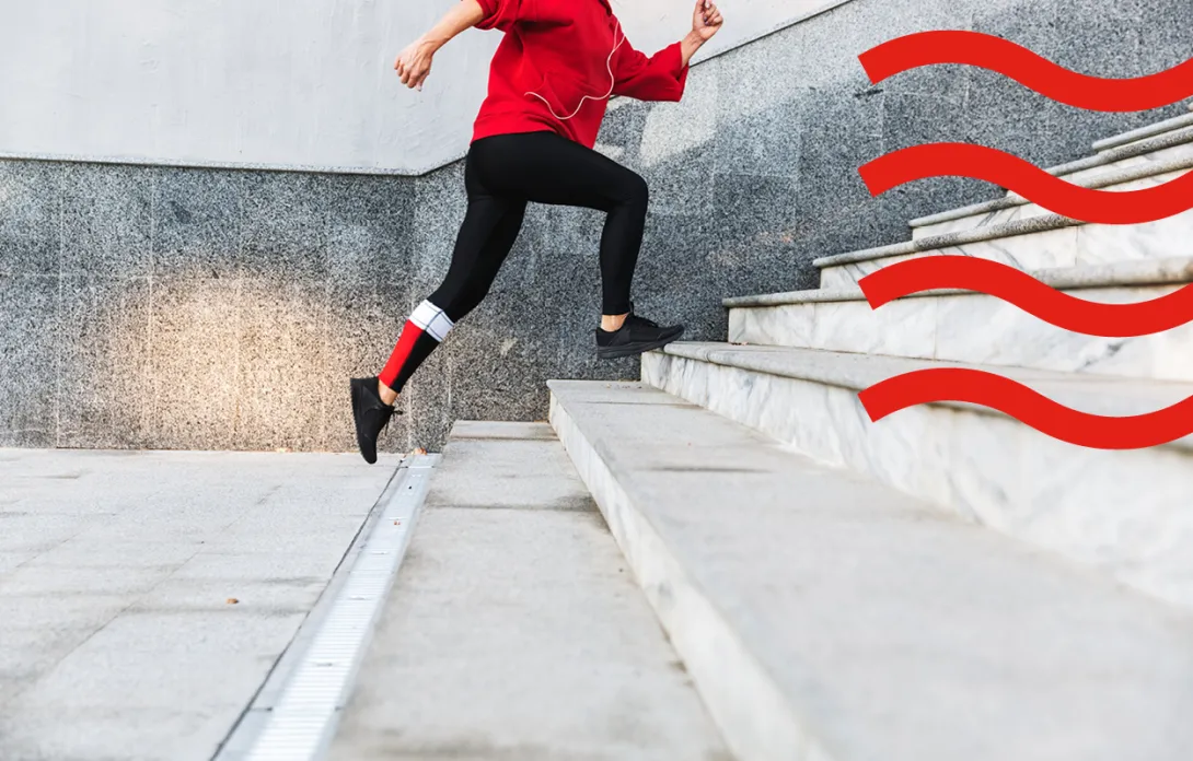 A woman running up the stairs