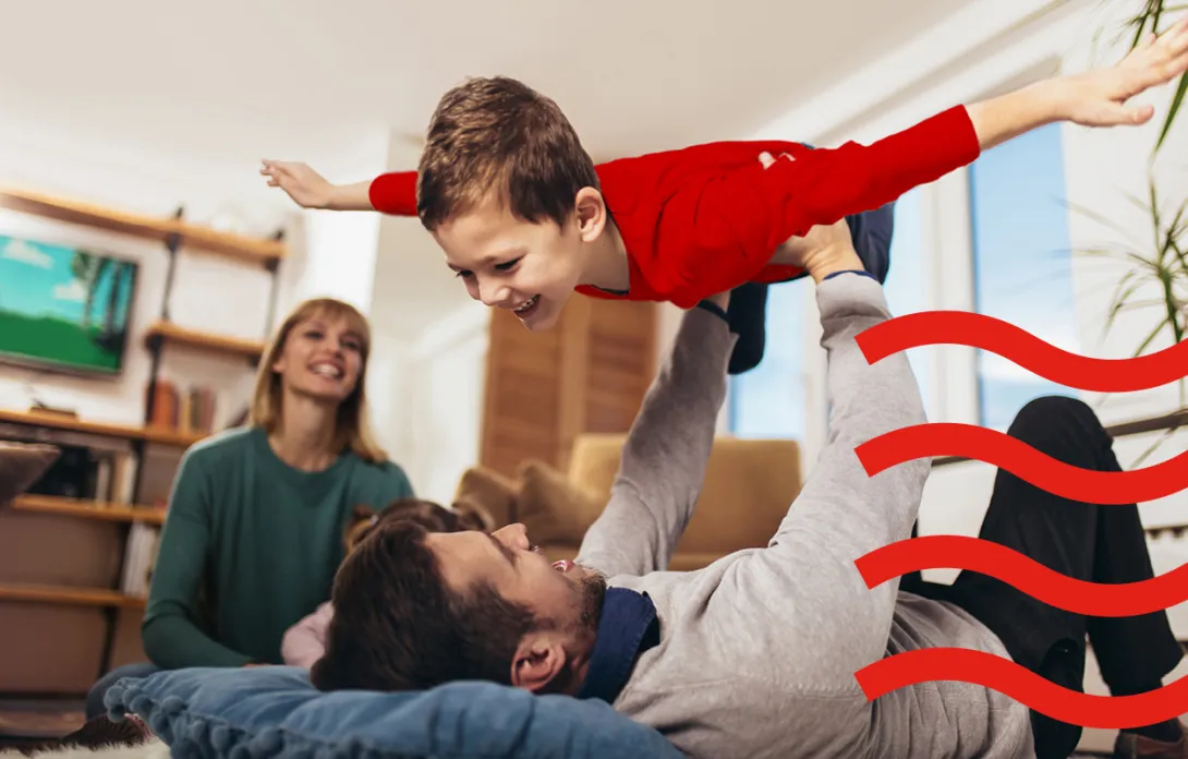 A dad playing with his son