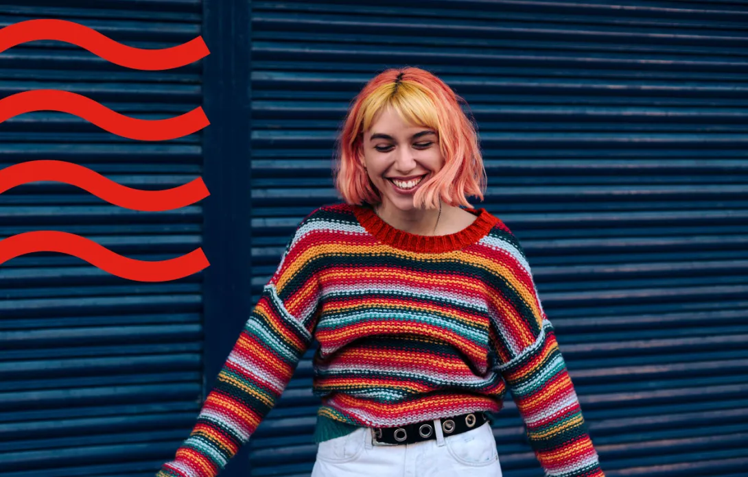 A girl with a colorful jumper 